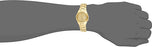 Seiko Men's SNK610 Seiko 5 Automatic Gold Dial Gold-Tone Stainless Steel Watch